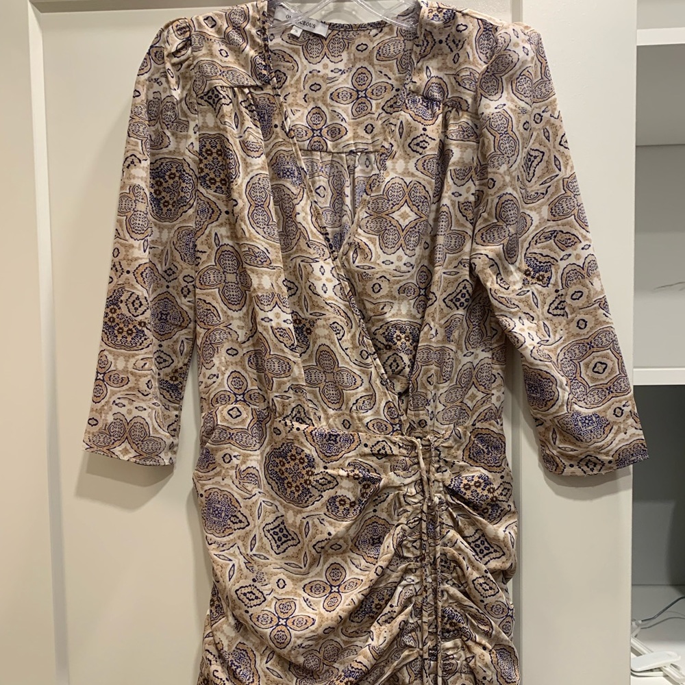 Dress with ruched waist and flounce hem